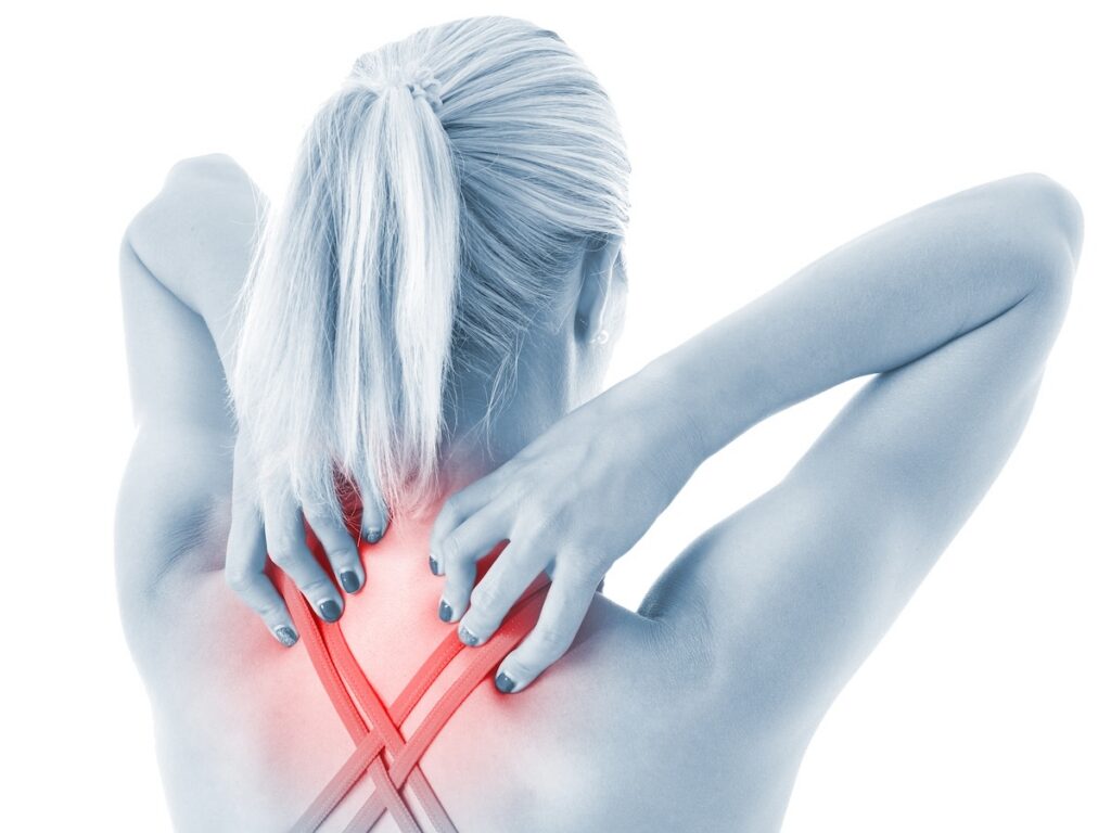 Red highlighting around neck pain - woman touching her neck