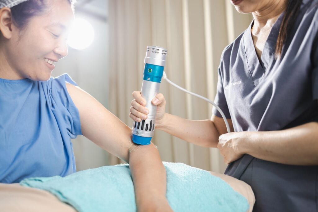 A shockwave therapy session provides physical relief and promotes healing for patient