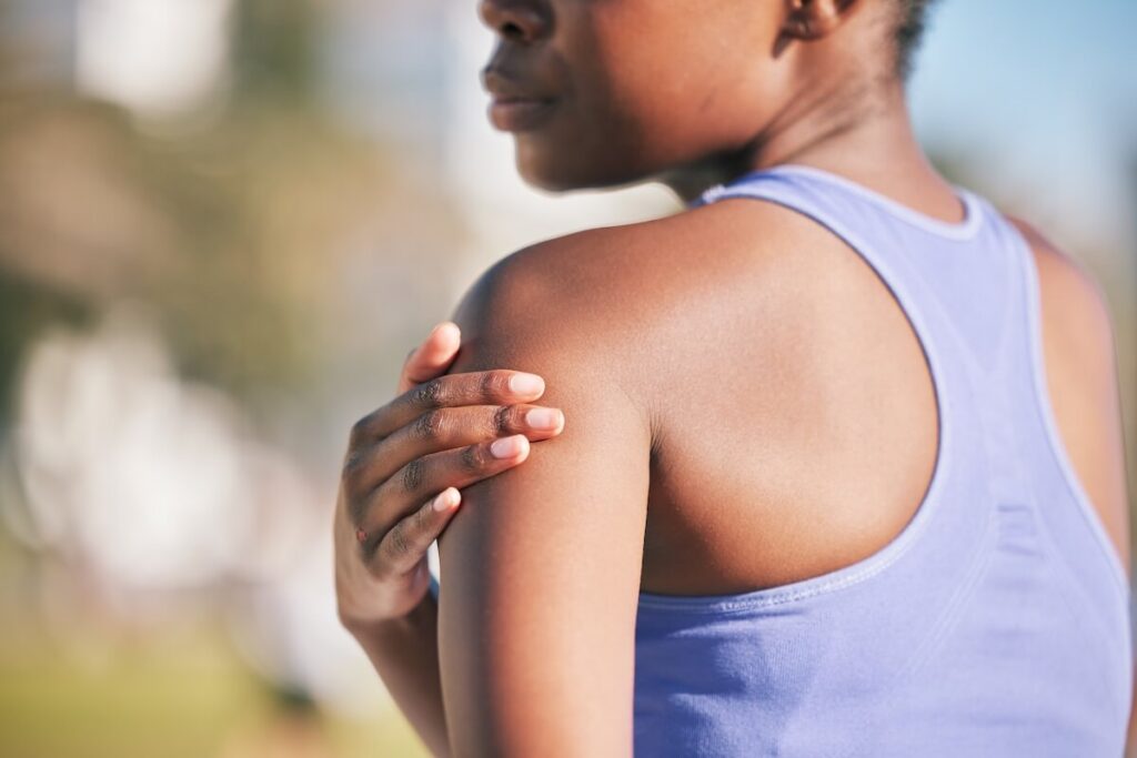 Woman needs physical therapy for shoulder injury.